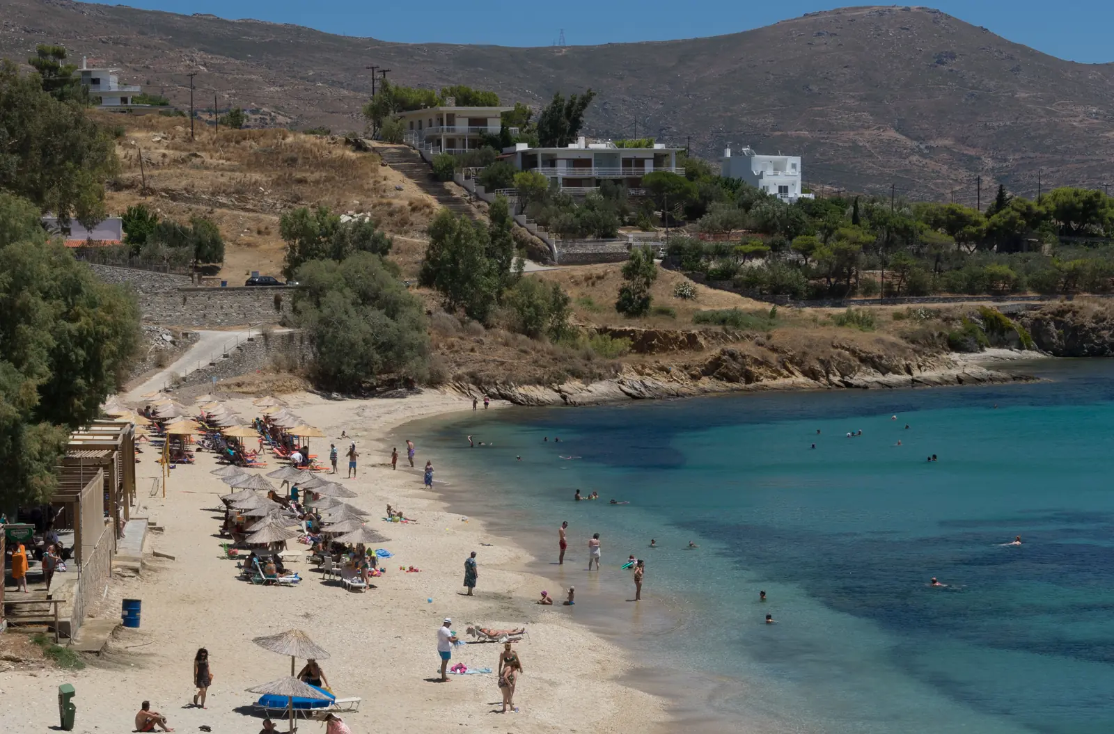 Sandy beach and turquoise shallows at Karystos on Euboea